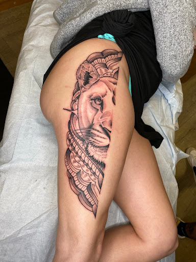 Explore wonder woman tattoo ideas, creative tattoo ideas in Newburgh, available at Millennium Tattoo