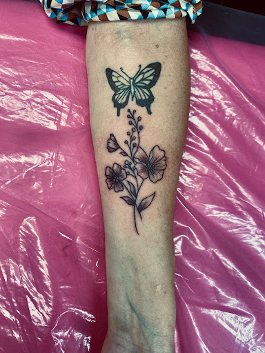 Explore knuckle tattoo ideas, creative tattoo ideas in Lake City, available at Crooked Spines Tattoo Studio