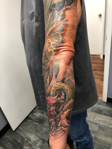 Explore life and death sleeve tattoo ideas, creative tattoo ideas in Des Moines, available at Skin Kitchen Tattoo