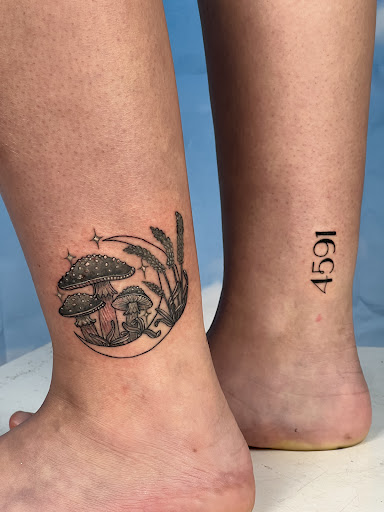 Explore middle of boob tattoo ideas, creative tattoo ideas in Syracuse, available at Perfect Storm Tattoo