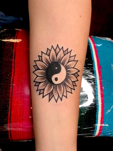 Explore tramp stamp cover up tattoo ideas, creative tattoo ideas in Modesto, available at Inkwell Tattoo