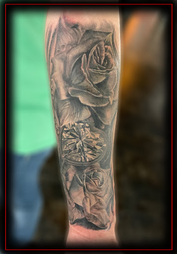 Explore half sleeve tattoo ideas for females, creative tattoo ideas in Columbus, available at Eternal Tattoo & Body Piercing - Columbus