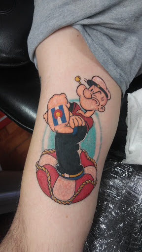 Explore knowledge tattoo ideas, creative tattoo ideas in Denver, available at Mile High Ink