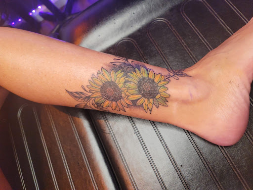 Explore arsenal tattoo ideas, creative tattoo ideas in Chattanooga, available at The Sailors Den Tattoos and Piercing & The Scurvy Pearl Music Venue