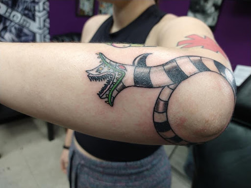 Explore solid black tattoo ideas, creative tattoo ideas in Crystal City, available at Meraki Tattoo and Piercing