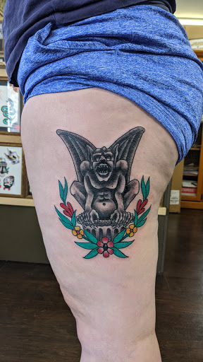 Explore red hand tattoo ideas, creative tattoo ideas in Tulsa, available at Black Gold Tattoo