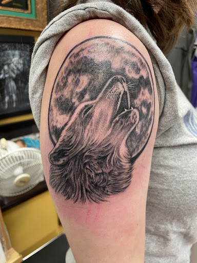 Find skull ideas sleeve tattoos for your next unique tattoo in Lockport at Tattoo City by Larry Brogan