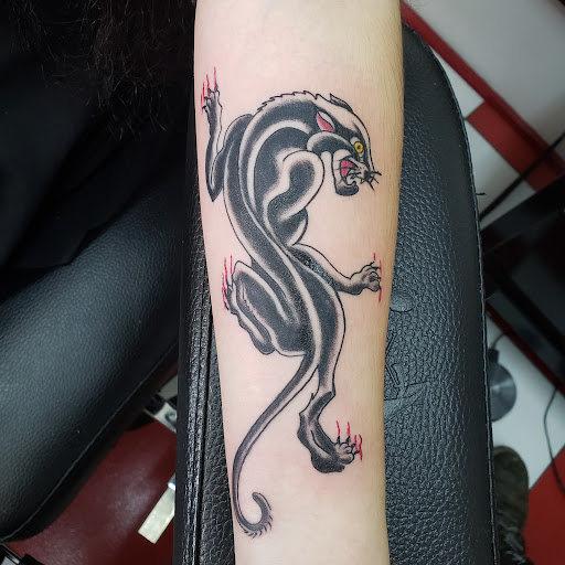Explore swiss tattoo ideas, creative tattoo ideas in Vinton, available at Cherry Bomb Tattoo and piercing