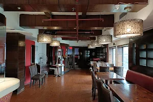 Red kitchen and lounge image