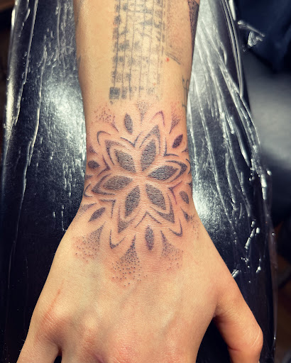 Explore rose tattoo ideas men, creative tattoo ideas in Spokane, available at Ron LeMay Tattoo