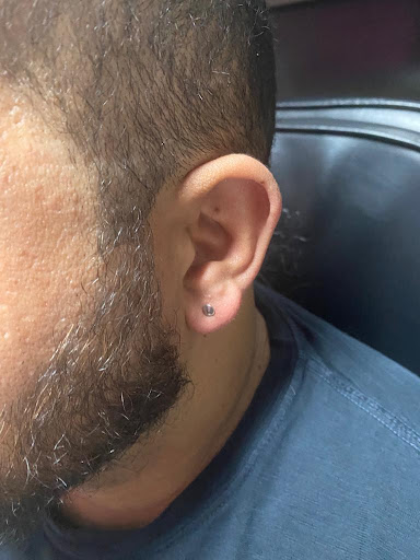 Explore women's arm tattoo ideas, creative tattoo ideas in Ocoee, available at Slaughterized Ink Tattoo and Piercing Studio