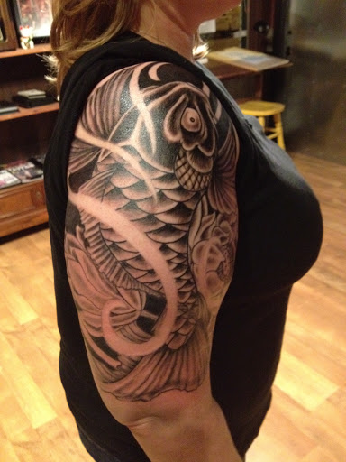 Find under the breast tattoo ideas for your next unique tattoo in Ventura at White Lotus Body Arts Studio
