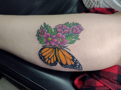 Explore gladiolus tattoo ideas, creative tattoo ideas in Owosso, available at Twisted ink tattoo