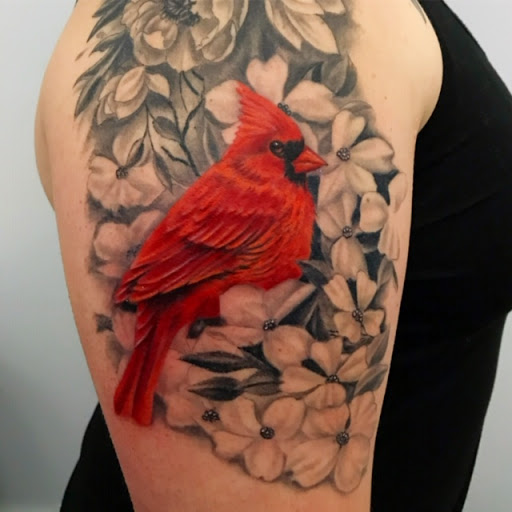 Explore cover up lower back tattoo ideas, creative tattoo ideas in Raleigh, available at Mad Ethels Tattoo & Body Piercing