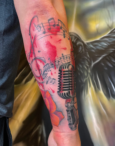 Explore floral tattoo filler ideas, creative tattoo ideas in Clarksville, available at Dark Raine Tattoo