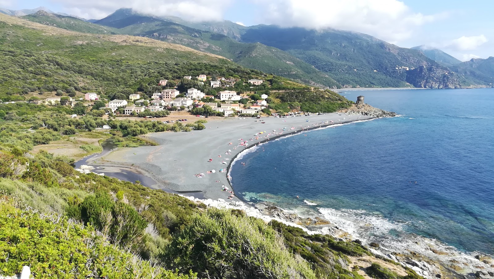 Photo of D'Albo beach with spacious bay