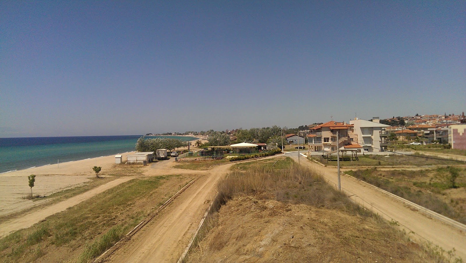 Flogita beach'in fotoğrafı düz ve uzun ile birlikte