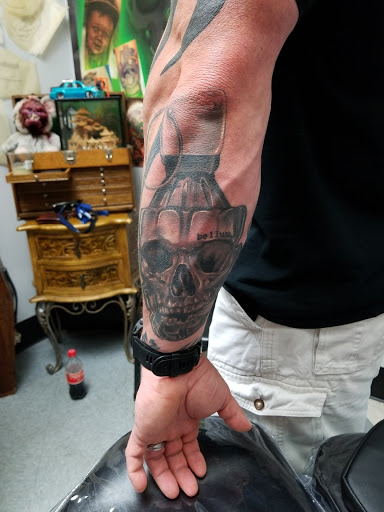 Explore wedding ring tattoo cover up ideas, creative tattoo ideas in Leesburg, available at Trademark Body Art