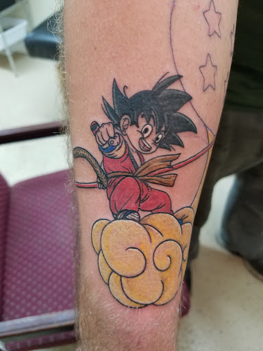 Explore atlas tattoo ideas, creative tattoo ideas in Cedar Creek, available at Inkd Out Tattoos