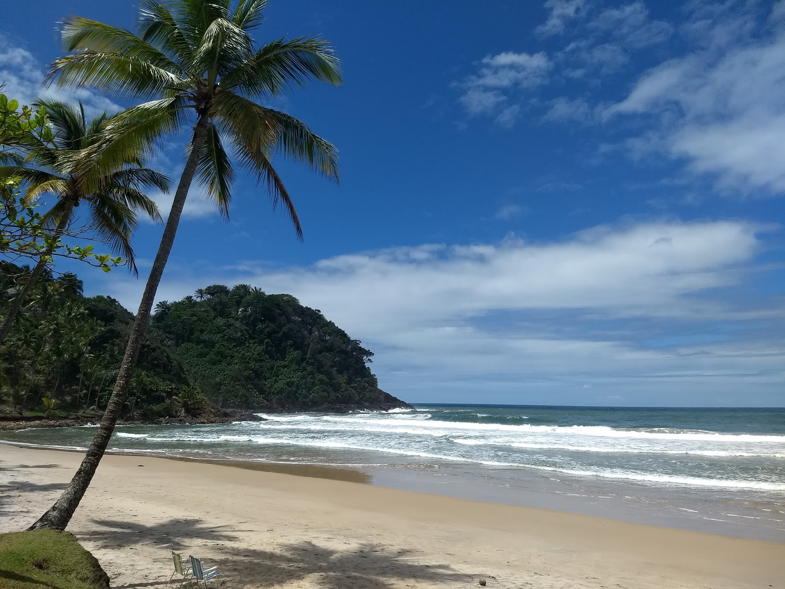Foto di Praia de Sao Jose con una superficie del sabbia beige fine