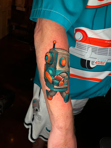 Explore romans 8 18 tattoo ideas, creative tattoo ideas in Winter Park, available at Golden Tarot Ink Club