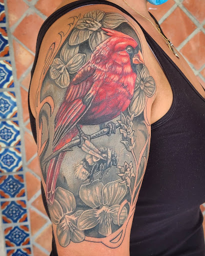 Explore quarter sleeve tattoo ideas, creative tattoo ideas in Stuart, available at Tiger Shark Tattoo Studio