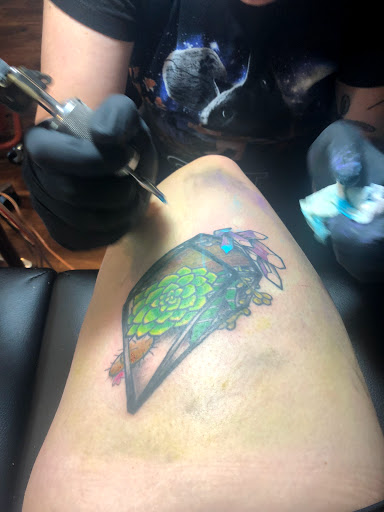 Explore little dragon tattoo ideas, creative tattoo ideas in Lawrence, available at Standard Electric Tattooing
