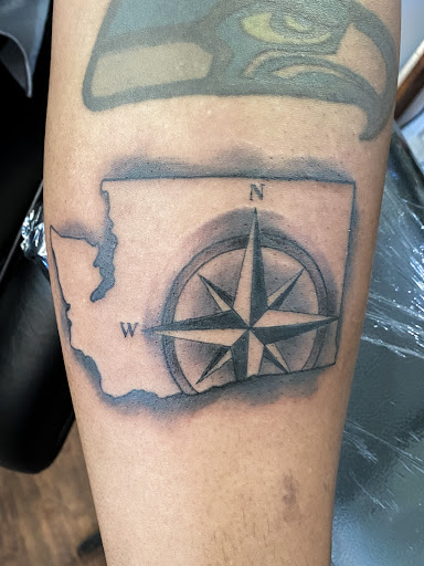 Explore black heart heart tattoo cover up ideas, creative tattoo ideas in Tacoma, available at Garfield Street Tattoo Co