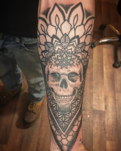 Explore religious tattoo ideas, creative tattoo ideas in Washburn, available at Elevated Vision Tattoo Studio