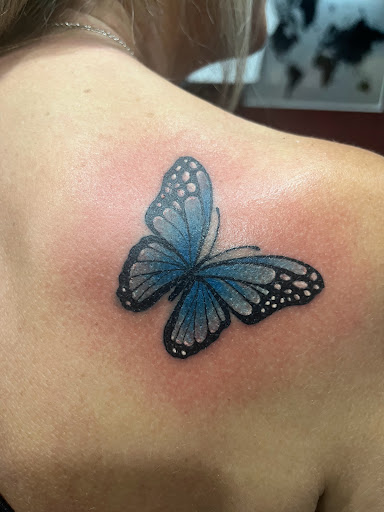 Explore memorial cross tattoo ideas, creative tattoo ideas in Cape Coral, available at UNRIVALED INK