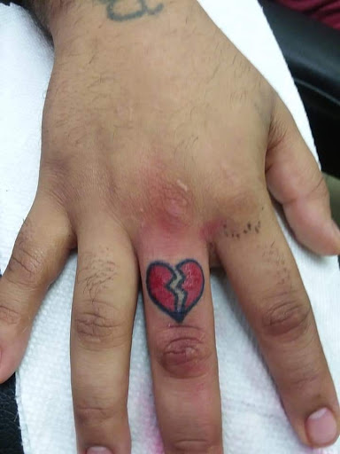 Explore gun tattoo ideas, creative tattoo ideas in Carbondale, available at MsCandyTattoo