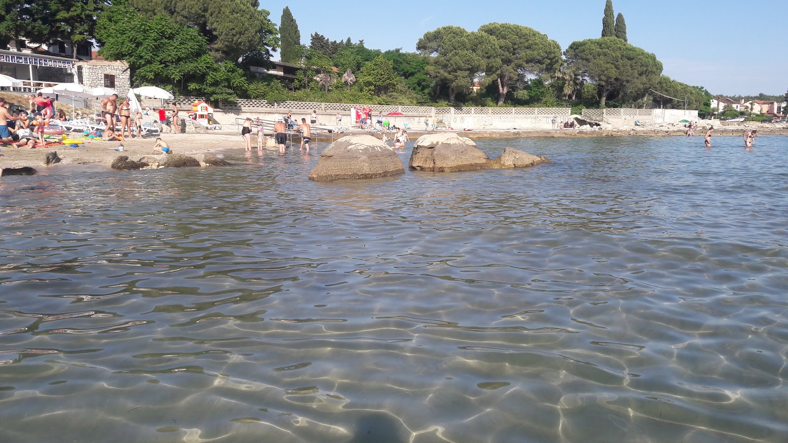 Photo of Zambratija beach with turquoise pure water surface