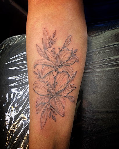 Explore tattoos tramp stamp ideas, creative tattoo ideas in Moweaqua, available at Fleshwound Tattoo