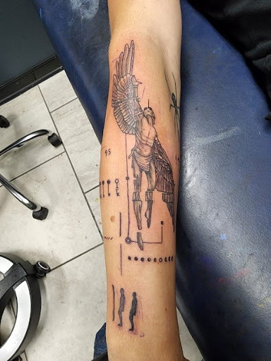 Explore initial tattoo ideas for guys, creative tattoo ideas in Foley, available at Symbolic Ink Tattoo Studio