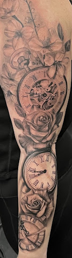 Explore cover up tattoo ideas for upper arm, creative tattoo ideas in Columbia, available at Black Widow Tattoo