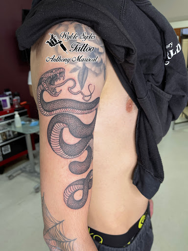 Explore raven tattoo ideas, creative tattoo ideas in San Diego, available at Wylde Sydes Tattoo & Body Piercing