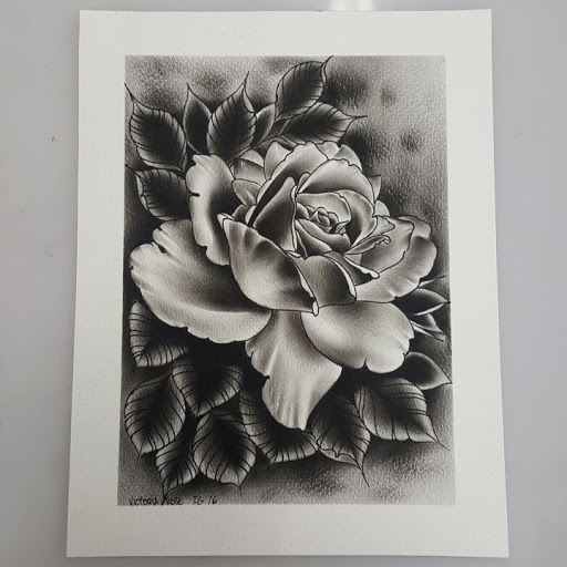 Explore dad tattoo ideas for men, creative tattoo ideas in Peoria, available at Iron Key Tattoo Studio Inc.