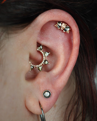 Explore tattoo ideas on lower stomach, creative tattoo ideas in Seattle, available at Bury Me In Gold Body Piercing