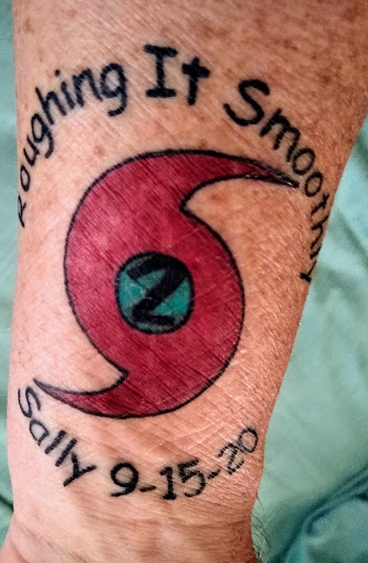 Explore race car tattoo ideas, creative tattoo ideas in Birmingham, available at Tattoo Expression