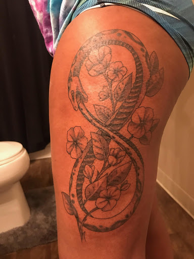 Explore miami dolphins tattoo ideas, creative tattoo ideas in Brighton, available at Alchemy Art Collective