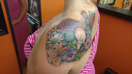 Explore tattoo ideas for hair stylist, creative tattoo ideas in Orlando, available at Cast Iron Tattoos
