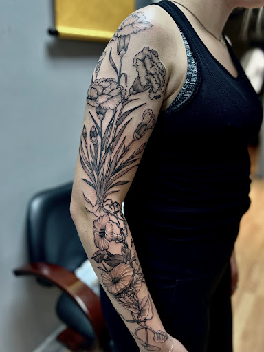 Explore gravestone tattoo ideas, creative tattoo ideas in Menomonie, available at Blue Dragon Tattoo
