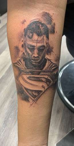 Find angel tattoo ideas for guys for your next unique tattoo in Kissimmee at Precision Ink Tattoo Company