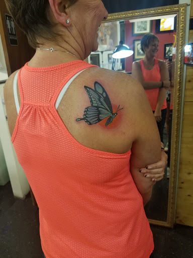 Explore men bicep tattoo ideas, creative tattoo ideas in Sioux City, available at Living Art Tattoo Studio