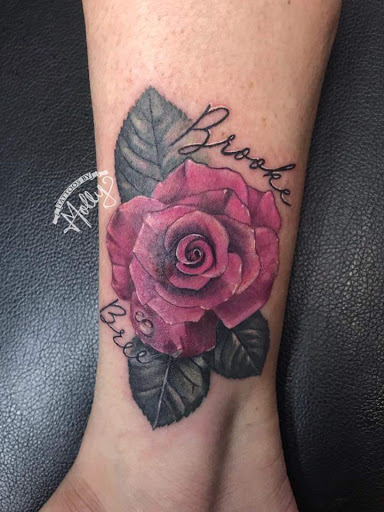 Explore lower back tattoo ideas, creative tattoo ideas in Ponchatoula, available at MONSTER INK