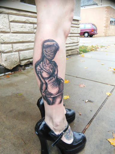 Explore dead space tattoo ideas, creative tattoo ideas in La Crosse, available at La Crosse Tattoo