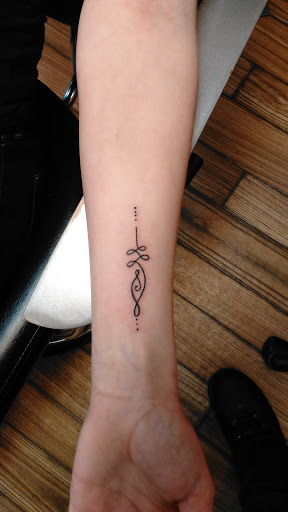 Explore mother daughter and son tattoo ideas, creative tattoo ideas in Newport, available at T N T Explosive Tattoo