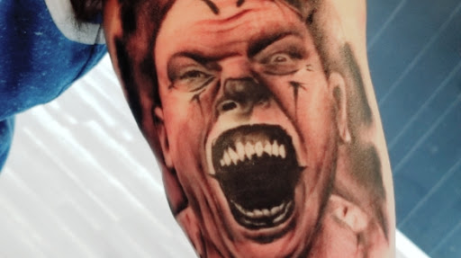 Explore back cover up tattoo ideas, creative tattoo ideas in Covington, available at River Ratz Tattoo