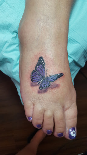 Explore rib tattoo cover up ideas, creative tattoo ideas in Roscoe, available at Elevated Ink Tattoo