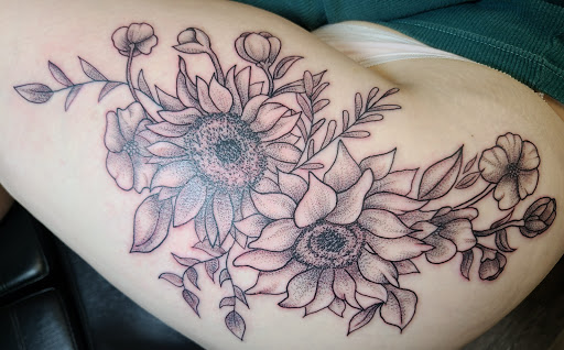Explore tattoo ideas inner bicep, creative tattoo ideas in Meadville, available at Lucky Lucys Tattoo and Art Studio